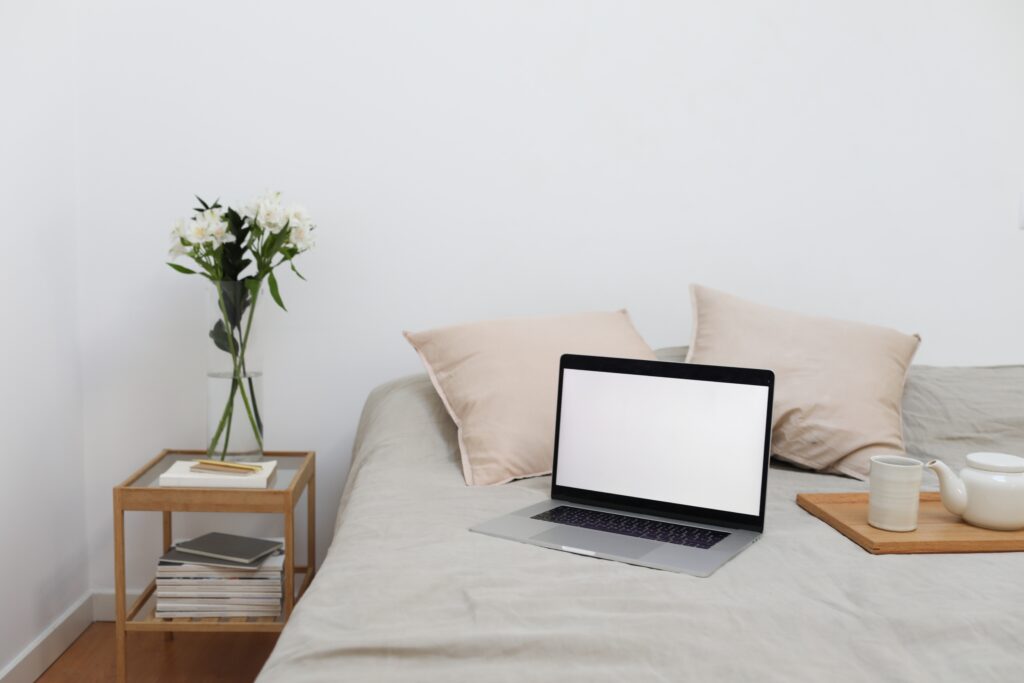 Laptop on the bed